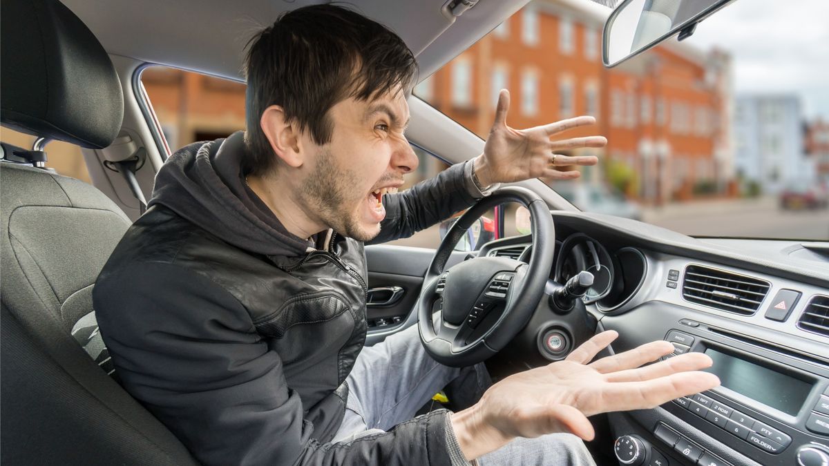 Angry,Young,Driver,Is,Driving,A,Car,And,Shouting.