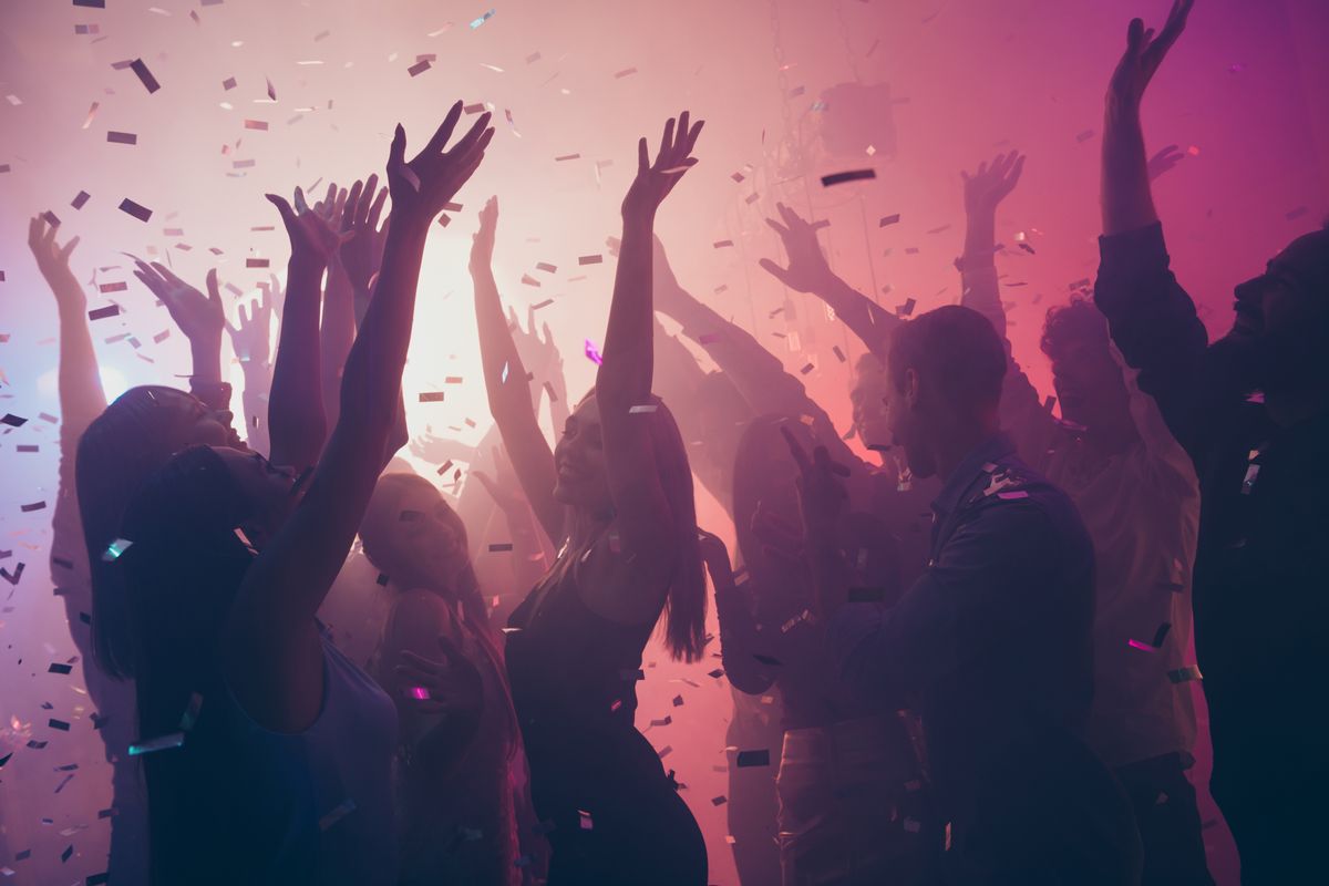 Photo,Of,Many,Birthday,Event,People,Dancing,Colorful,Lights,Confetti