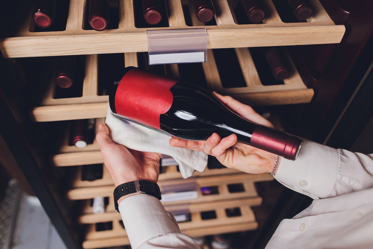 Storing,Bottles,Of,Wine,In,Fridge.,Alcoholic,Card,In,Restaurant.